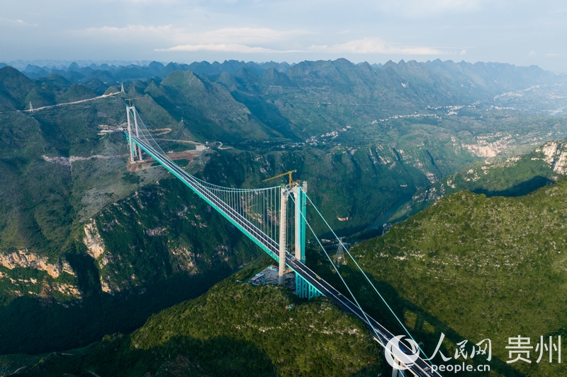 在建世界第一高桥——花江峡谷大桥。人民网记者 涂敏摄.jpg 在建世界第一高桥——花江峡谷大桥。人民网记者 涂敏摄.jpg